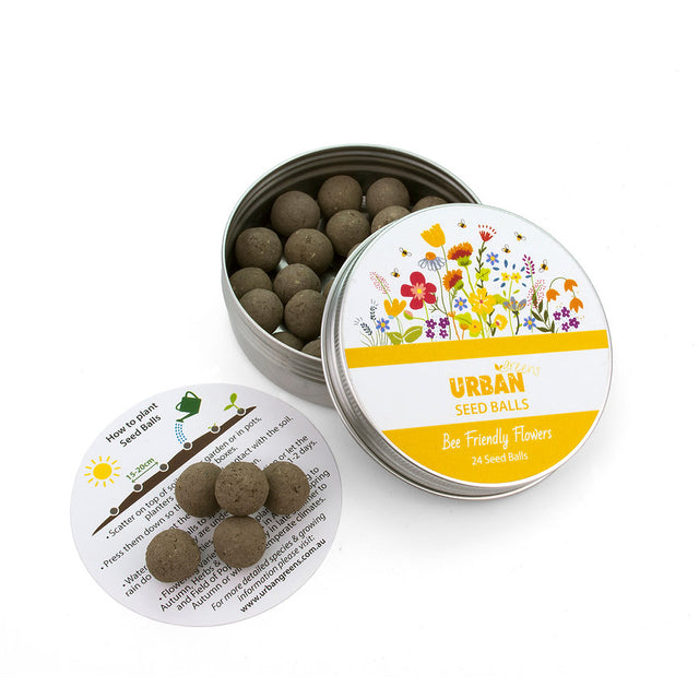 Tin of Urban Seed Balls with colorful label on a white background