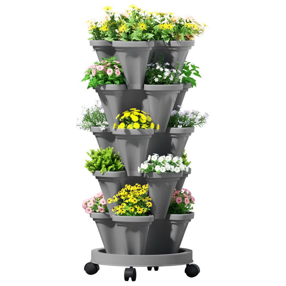 Gray tiered vertical garden with plants on a white background