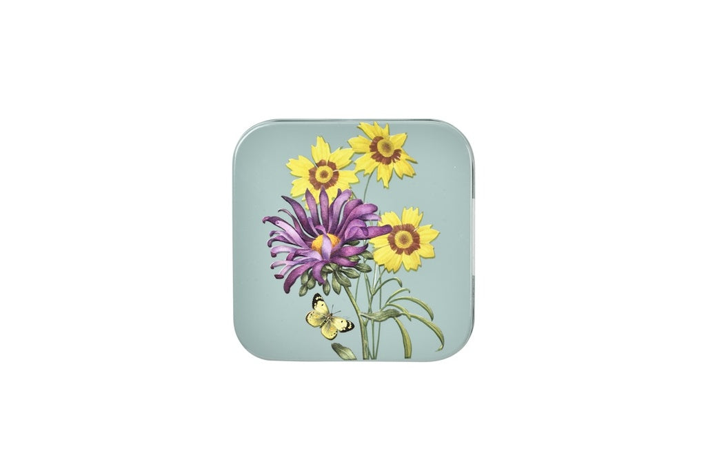 Square coaster with floral design on a light blue background