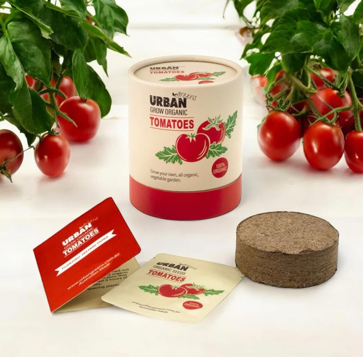 Urban Tomatoes gardening kit with tomato plants and products on a white background