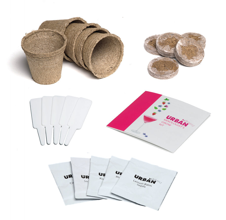 Set of biodegradable pots, seedling trays, and a leaf blower on a white background