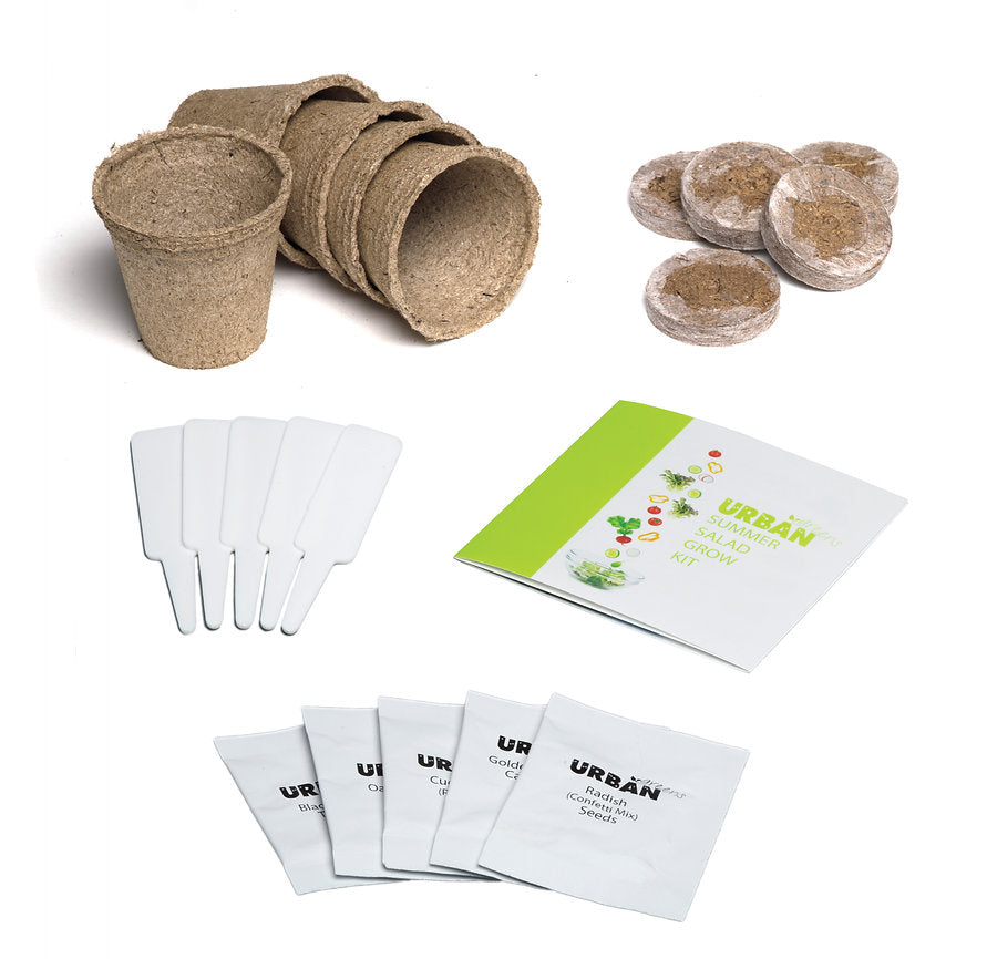 Set of biodegradable planting cups, pots, labels, and a guide on a white background