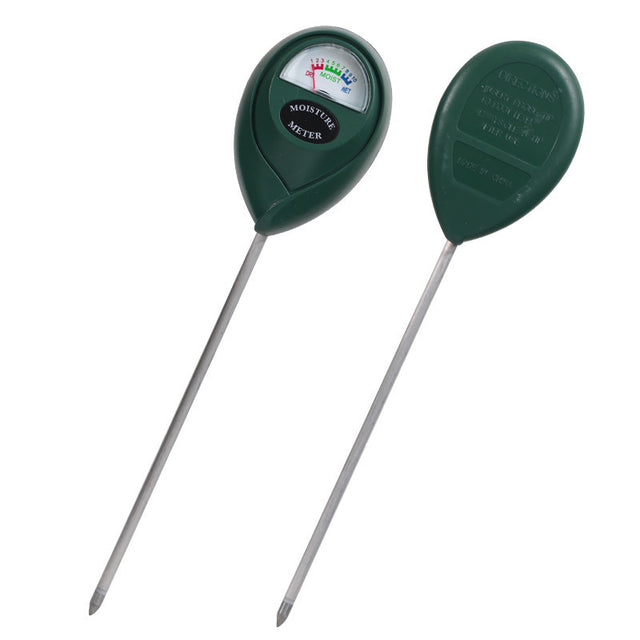 Two green moisture meters with silver probes on a white background