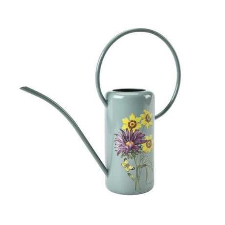 Light blue watering can with floral design on a white background
