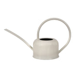 White watering can on a white background