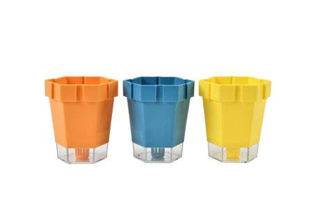 orange blue and yellow plastic plant pots for children on white background